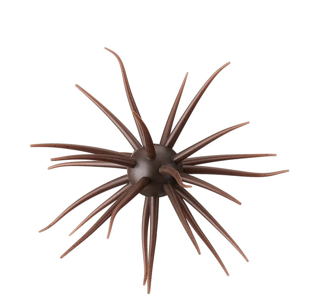 Brown star-shaped fishing lure on a white background