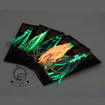 Glowing fishing lures on a black background with Ocean's Legacy logo.