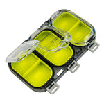 Yellow and clear plastic container with multiple compartments on a white background