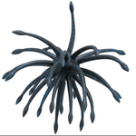 A dark gray, multi-armed creature lure with blue speckles, resembling a stylized sea monster or tentacleed creature, isolated on a white background.