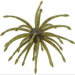A yellow-green anemone-shaped fishing lure piece with multiple translucent tentacles and small dark speckles, isolated on a white background.