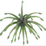 A green plastic soft plastic lure sea anemone with multiple tentacles speckled with small red and black dots, isolated on a white background.