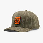 Camouflage baseball cap with an orange patch on a white background