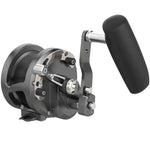Fishing reel with black handle on a white background