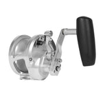 Fishing reel with metallic body and black handle on a white background