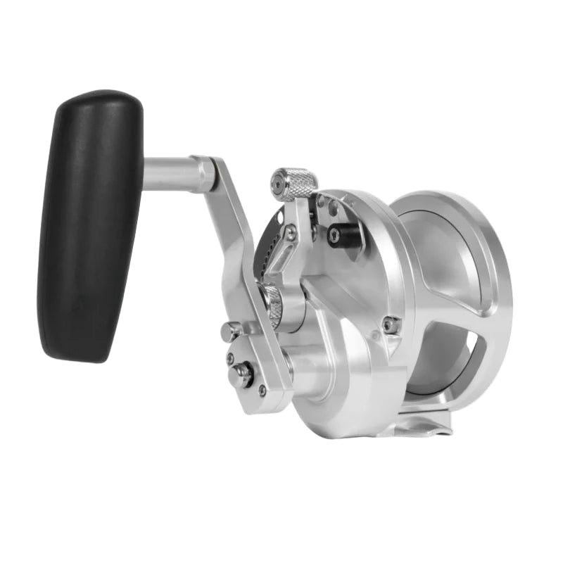 Metallic fishing reel with black handle on a white background