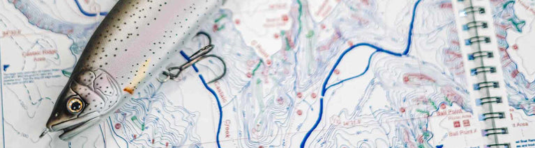 Image with fishing lure on top of a map.