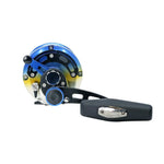 A fishing reel with a black handle and a metallic body featuring a blue-to-yellow gradient finish, shown on a plain white background.