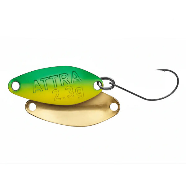 Fishing lure with green and gold colors on a white background