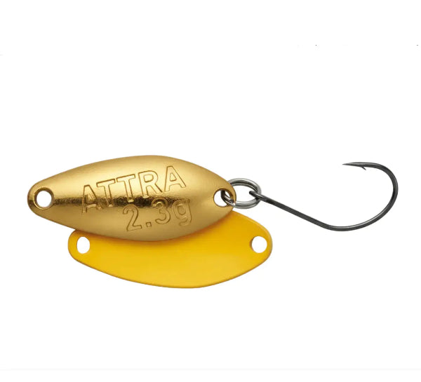 Gold and yellow fishing lure with 'ATTRA' branding on a white background